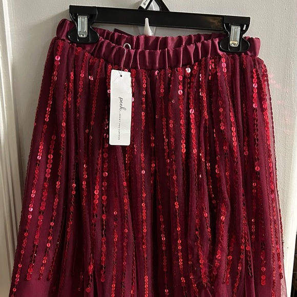 Brand new! Girls Peek brand deep red/ burgundy sequined skirt. - Picture 2 of 3